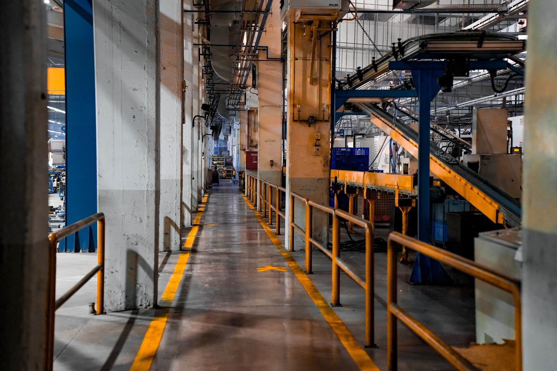 Conveyor systems inside an active manufacturing facility