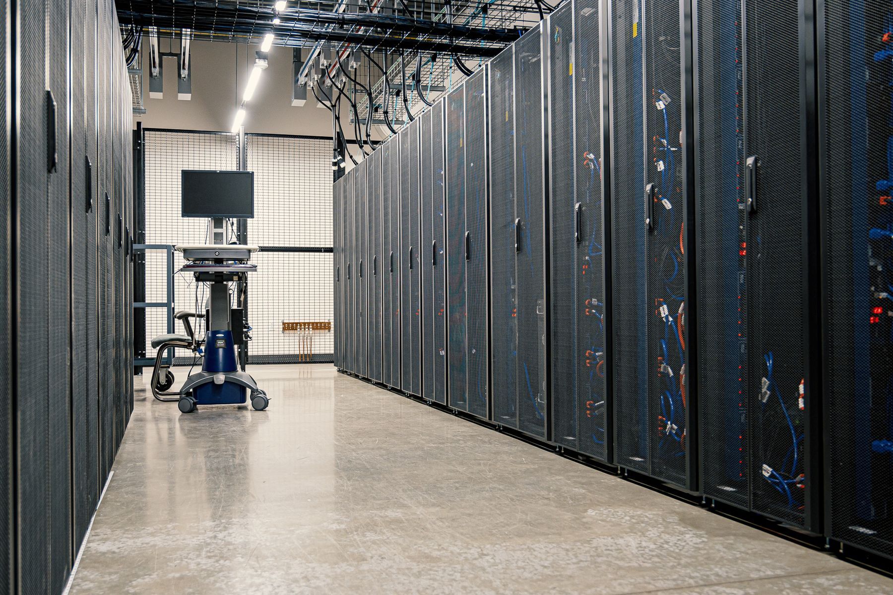 Modern data center corridor with server racks